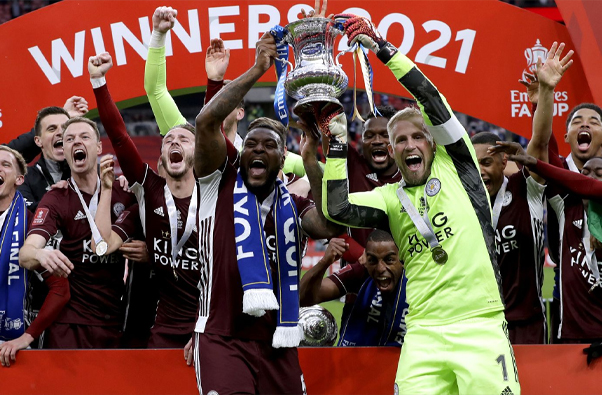 Team Holding Trophy